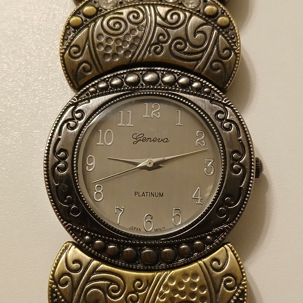 Geneva Platinum Women's Rhinestone Decorative Multi-Tone Swirl Design Watch